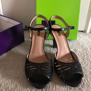 Left & Right black open toe pumps